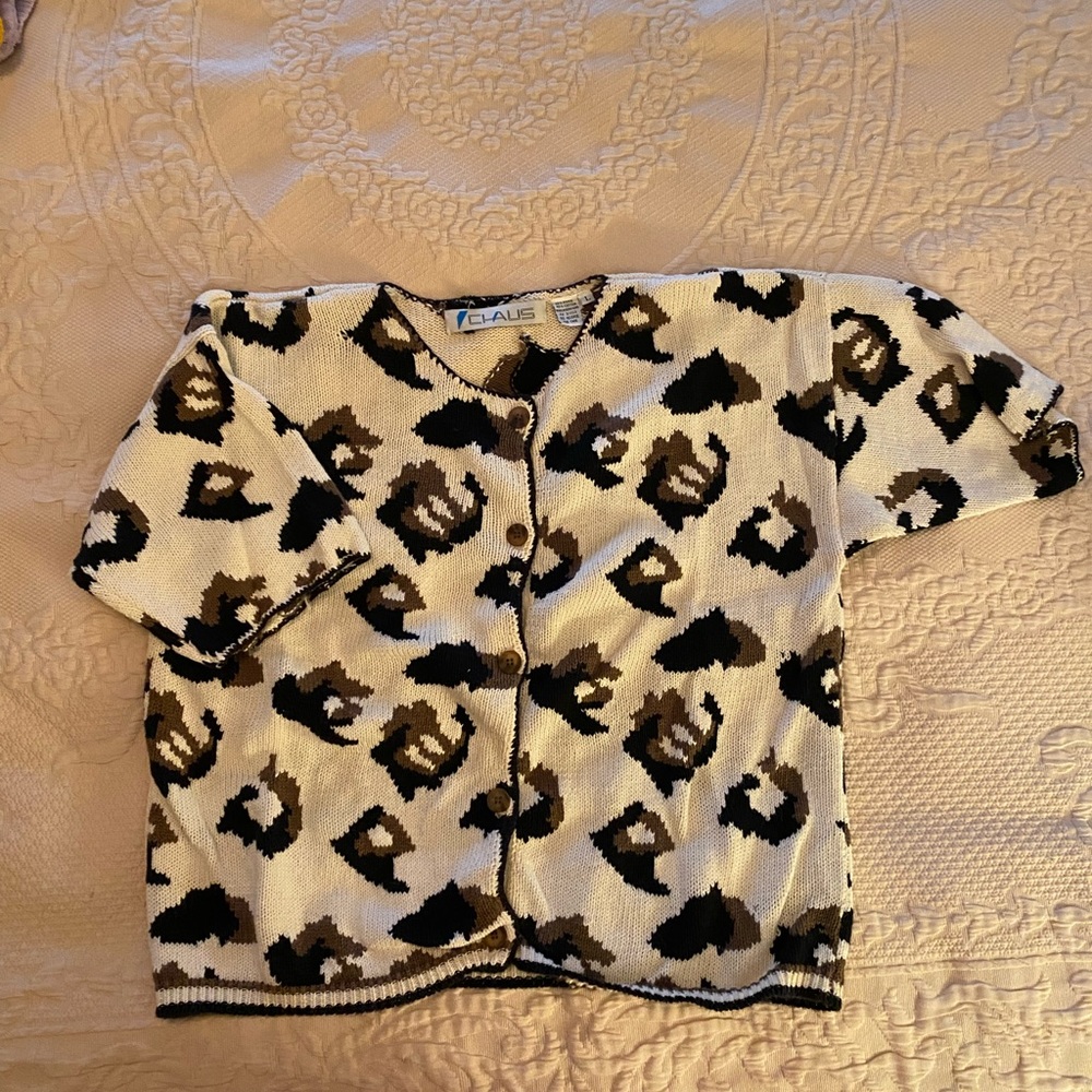 Bold cheetah print short sleeve, button front, sweater. Fun & flirty. Chaus.